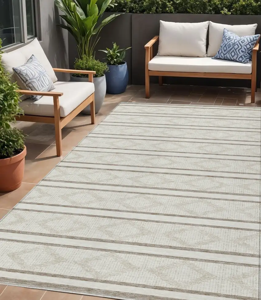 Ivory And Brown Geometric Washable Indoor Outdoor Area Rug Photo 1