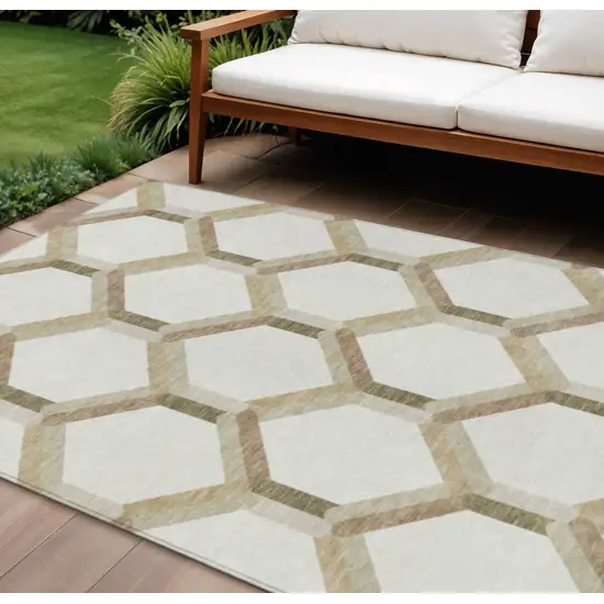 Ivory And Brown Geometric Washable Indoor Outdoor Area Rug Photo 1