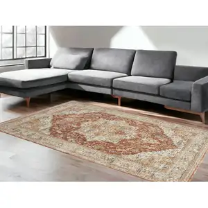 Photo of Ivory And Brown Oriental Distressed Area Rug