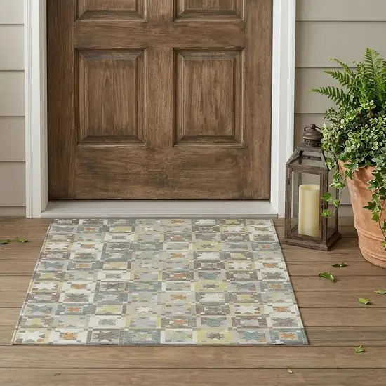 Ivory And Brown Patchwork Washable Indoor Outdoor Area Rug Photo 1