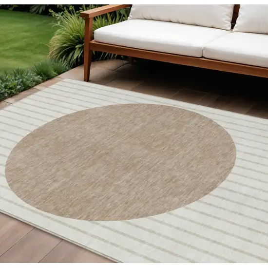 Ivory And Brown Striped Washable Indoor Outdoor Area Rug Photo 1