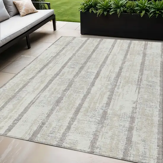 Ivory And Brown Striped Washable Indoor Outdoor Area Rug Photo 1