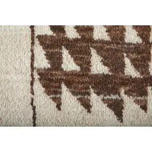 Photo of Ivory And Brown Wool Abstract Hand Knotted Area Rug