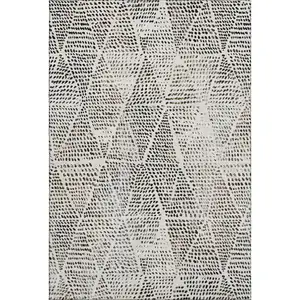 Photo of Ivory And Charcoal Diamond Washable Area Rug With UV Protection