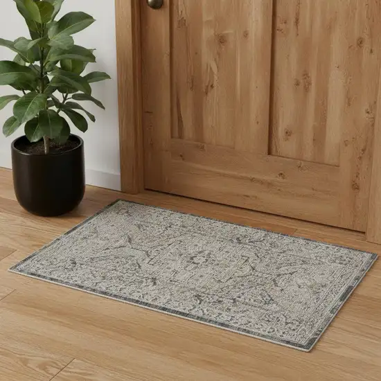 Ivory And Charcoal Medallion Distressed Area Rug With Fringe Photo 1