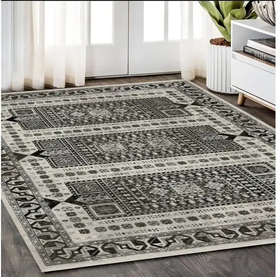 Ivory And Charcoal Oriental Area Rug With Fringe Photo 1