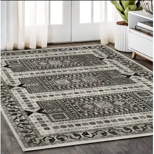 Photo of Ivory And Charcoal Oriental Area Rug With Fringe