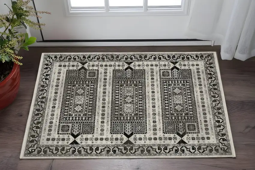 Ivory And Charcoal Oriental Area Rug With Fringe Photo 1