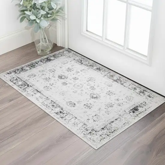 Ivory And Charcoal Oriental Distressed Washable Area Rug Photo 1