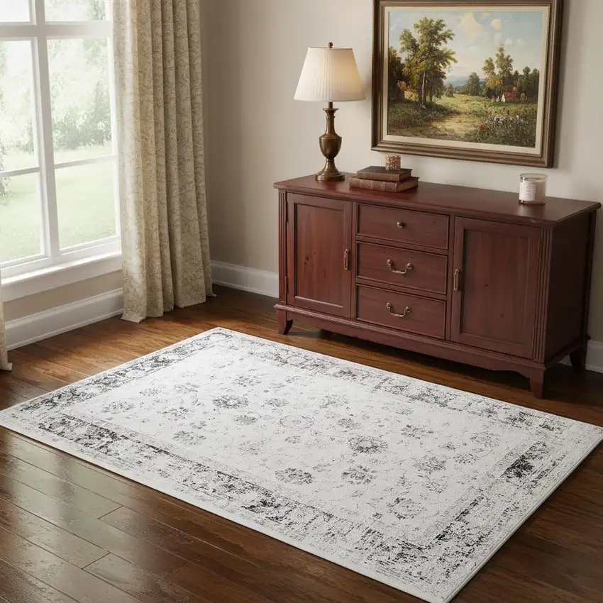 Ivory And Charcoal Oriental Distressed Washable Area Rug Photo 1