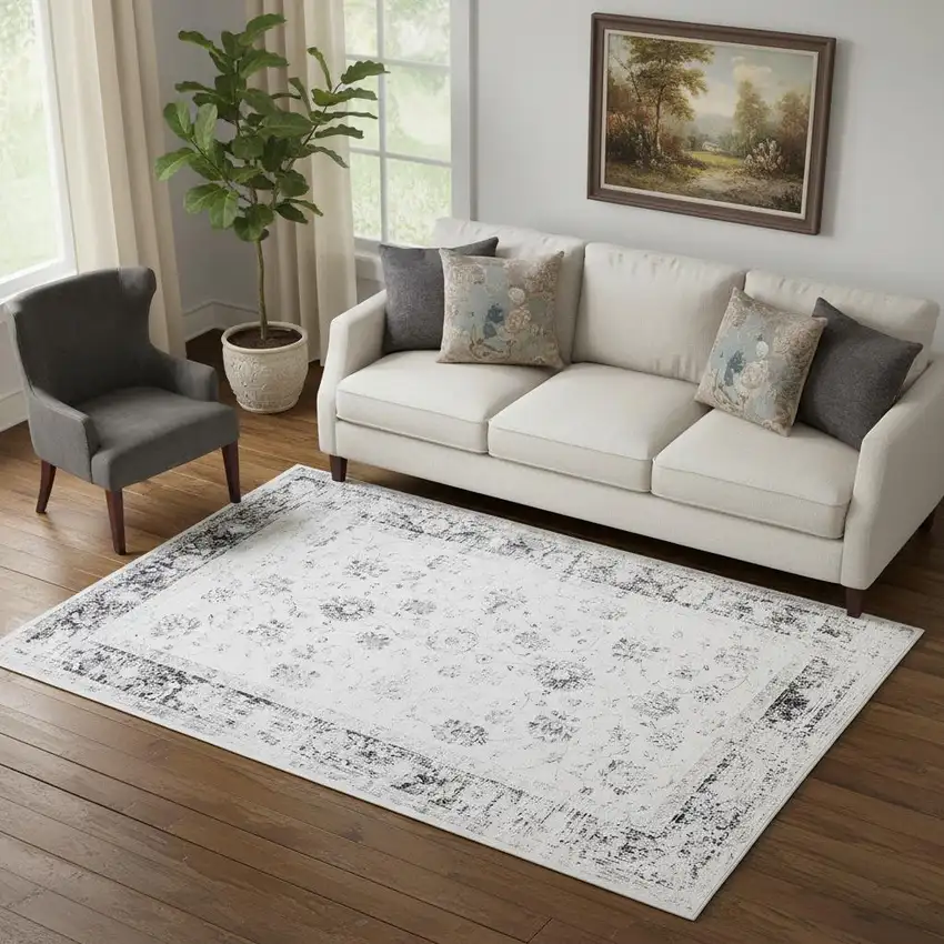 Ivory And Charcoal Oriental Distressed Washable Area Rug Photo 1
