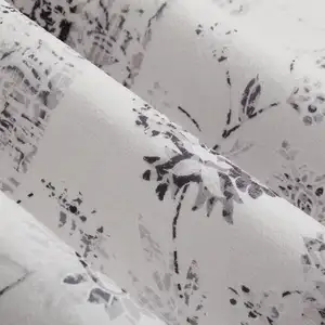 Photo of Ivory And Charcoal Oriental Distressed Washable Area Rug