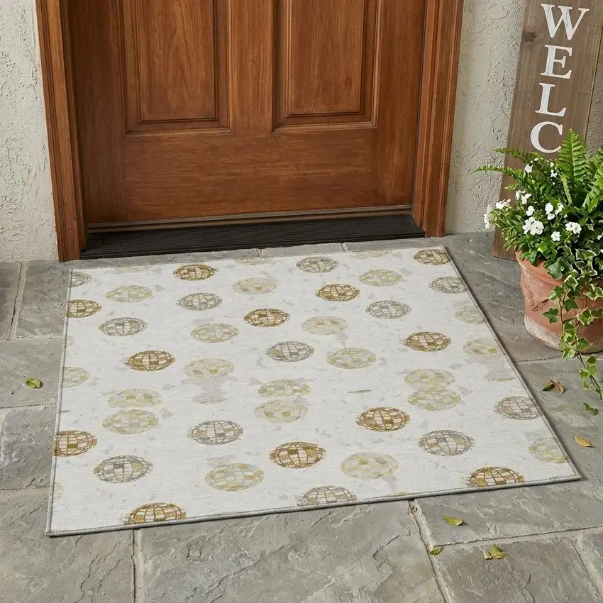 Ivory And Copper Geometric Washable Indoor Outdoor Area Rug Photo 1