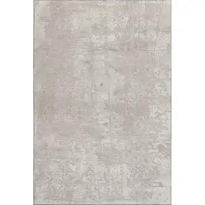 Photo of Ivory And Cream Abstract Washable Area Rug With UV Protection