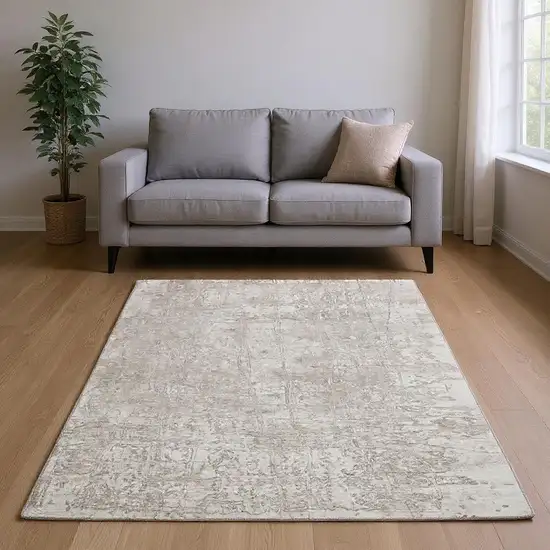 Ivory And Cream Abstract Washable Area Rug With UV Protection Photo 2