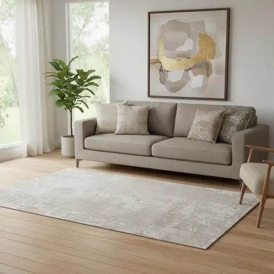 Ivory And Cream Abstract Washable Area Rug With UV Protection Photo 1