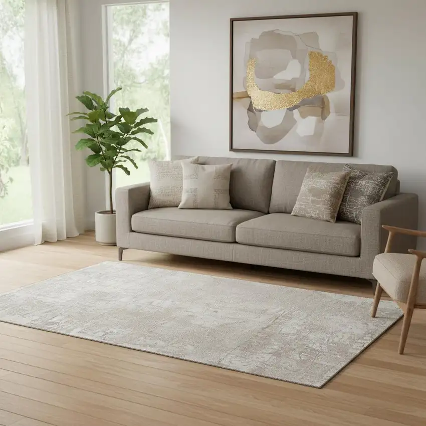 Ivory And Cream Abstract Washable Area Rug With UV Protection Photo 1