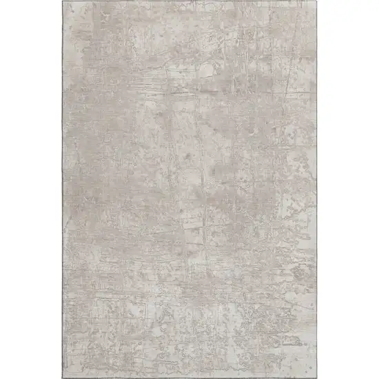 Ivory And Cream Abstract Washable Area Rug With UV Protection Photo 1