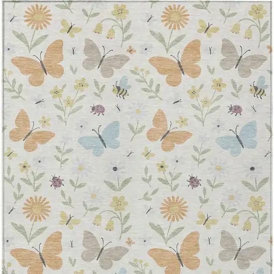 Ivory And Cream Abstract Washable Indoor Outdoor Area Rug Photo 1