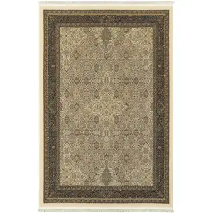 Photo of Ivory And Dark Blue Medallion Area Rug With Fringe