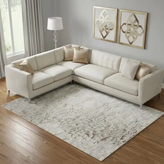 Ivory And Gold Abstract Area Rug Photo 1