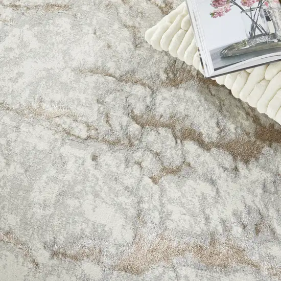 Ivory And Gold Abstract Area Rug Photo 9