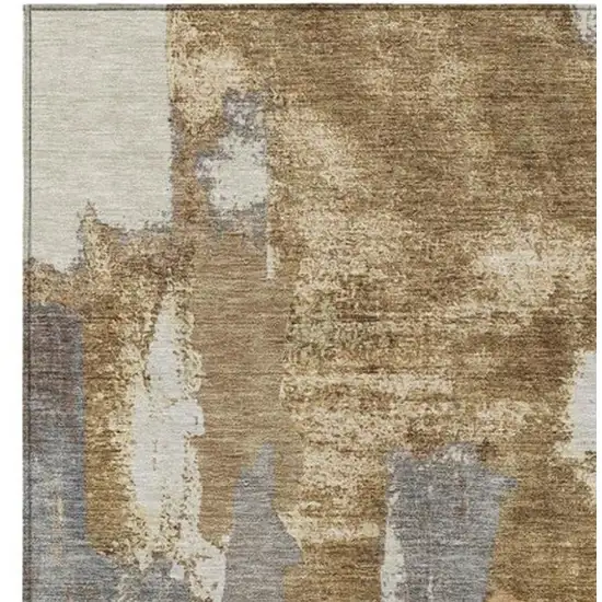 Ivory And Gold Abstract Washable Indoor Outdoor Area Rug Photo 3