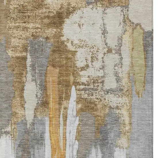 Ivory And Gold Abstract Washable Indoor Outdoor Area Rug Photo 9