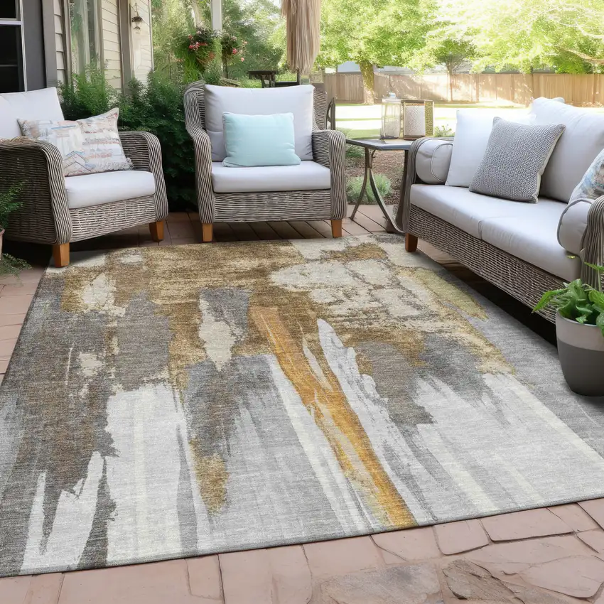 Ivory And Gold Abstract Washable Indoor Outdoor Area Rug Photo 3