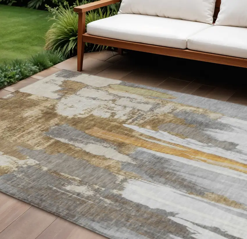 Ivory And Gold Abstract Washable Indoor Outdoor Area Rug Photo 2