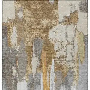 Photo of Ivory And Gold Abstract Washable Indoor Outdoor Area Rug