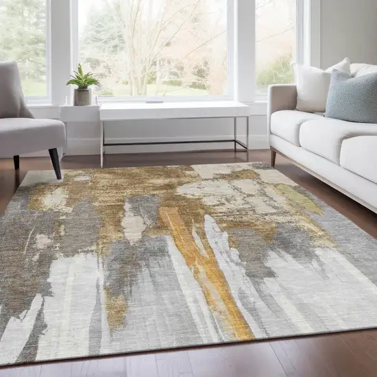 Ivory And Gold Abstract Washable Indoor Outdoor Area Rug Photo 6
