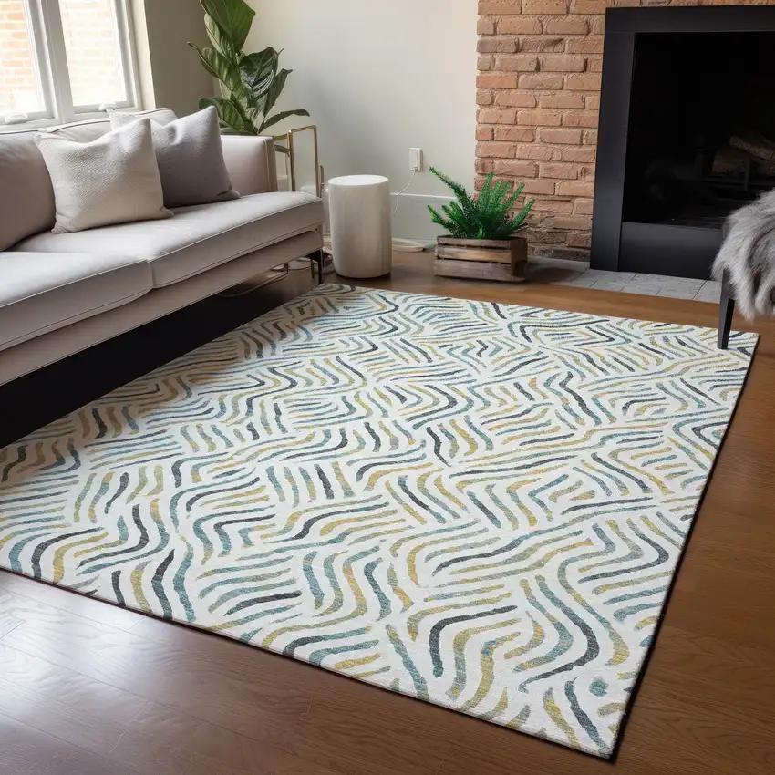 Ivory And Gold Abstract Washable Indoor Outdoor Area Rug Photo 5