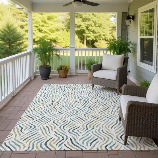 Ivory And Gold Abstract Washable Indoor Outdoor Area Rug Photo 4