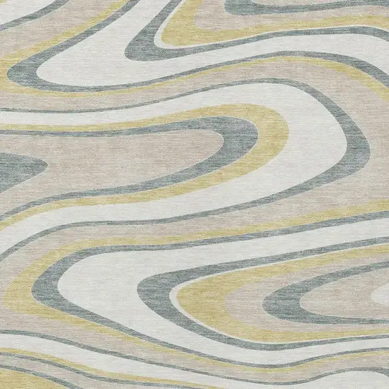 Ivory And Gold Abstract Washable Indoor Outdoor Area Rug Photo 3
