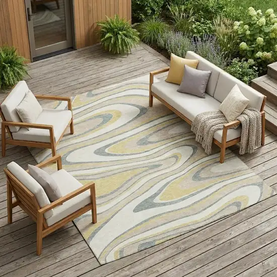 Ivory And Gold Abstract Washable Indoor Outdoor Area Rug Photo 1