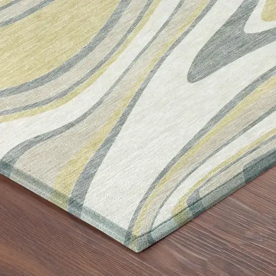 Ivory And Gold Abstract Washable Indoor Outdoor Area Rug Photo 5