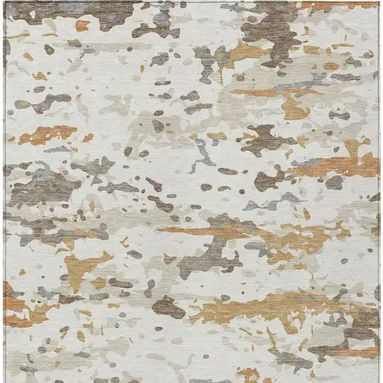 Ivory And Gold Abstract Washable Indoor Outdoor Area Rug Photo 3