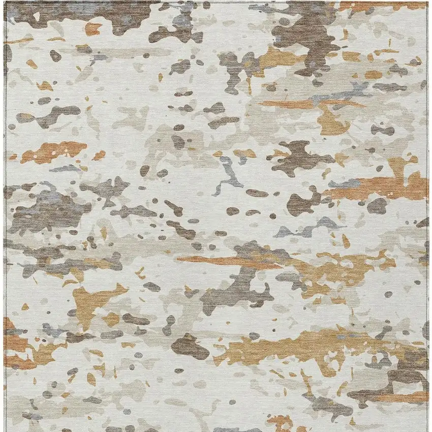 Ivory And Gold Abstract Washable Indoor Outdoor Area Rug Photo 3
