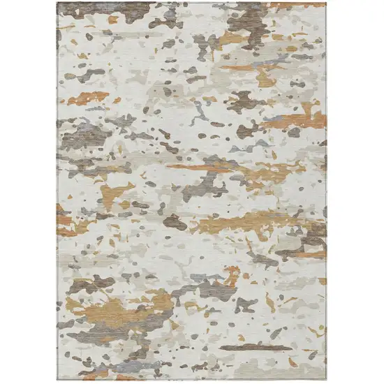 Ivory And Gold Abstract Washable Indoor Outdoor Area Rug Photo 1