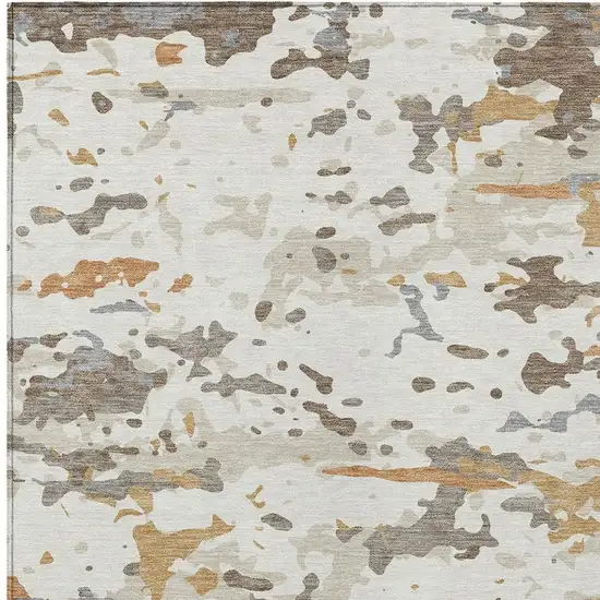 Ivory And Gold Abstract Washable Indoor Outdoor Area Rug Photo 2