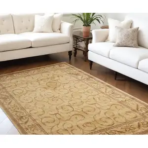 Photo of Ivory And Gold Floral Non Skid Area Rug