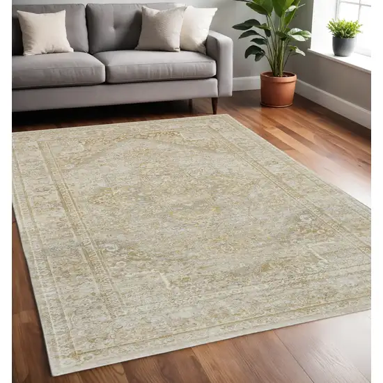 Gold And Ivory Floral Medallion Area Rug Photo 2