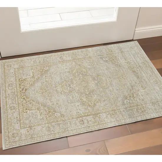 Gold And Ivory Floral Medallion Area Rug Photo 1