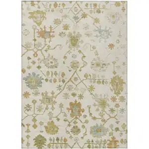Photo of Ivory And Gold Floral Washable Indoor Outdoor Area Rug