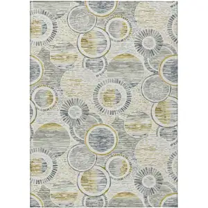 Photo of Ivory And Gold Geometric Washable Indoor Outdoor Area Rug