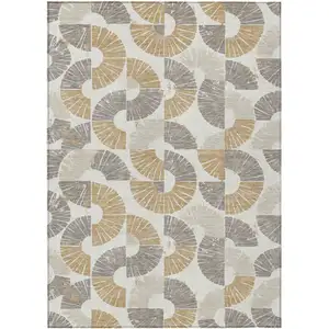 Photo of Ivory And Gold Geometric Washable Indoor Outdoor Area Rug