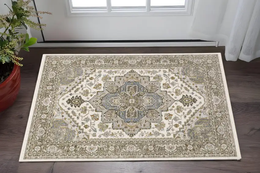 Ivory And Gold Medallion Distressed Area Rug With Fringe Photo 1