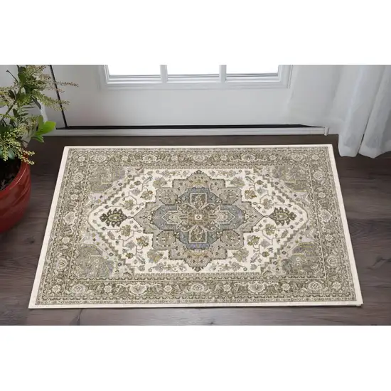 Ivory And Gold Medallion Distressed Area Rug With Fringe Photo 1