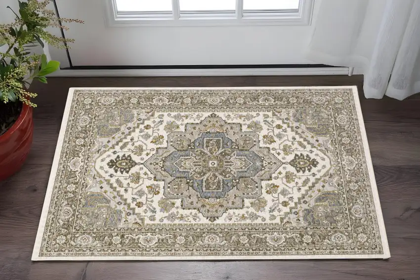 Ivory And Gold Medallion Distressed Area Rug With Fringe Photo 1